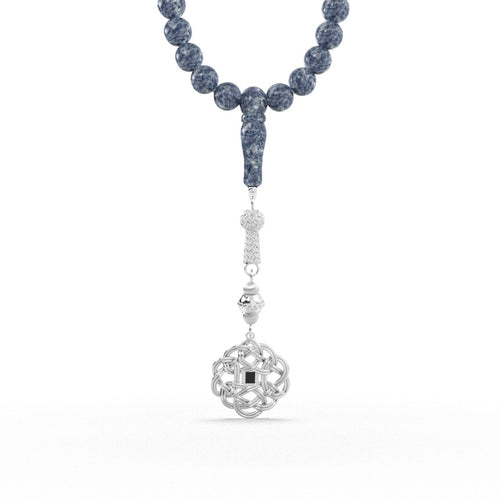 Silver tasbih with blue beads and a detailed silver pendant featuring a Quran-inscribed nano chip, displayed on a white background.