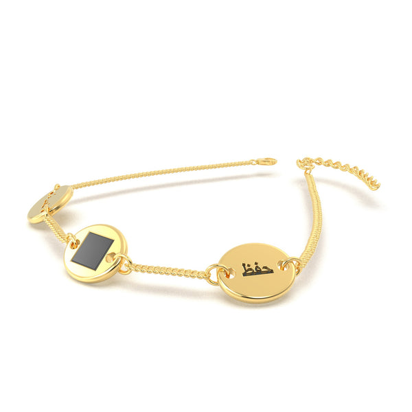 Gold bracelet with three round-and-square pendants, featuring a central square black nano chip inscribed with the entire Quran, displayed on a white background.