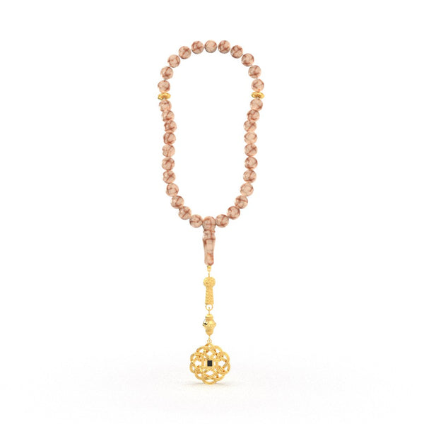 Elegant tasbih featuring pink and white gemstone beads with a beautifully crafted gold pendant, containing a nano chip micro-engraved with the entire Quran.