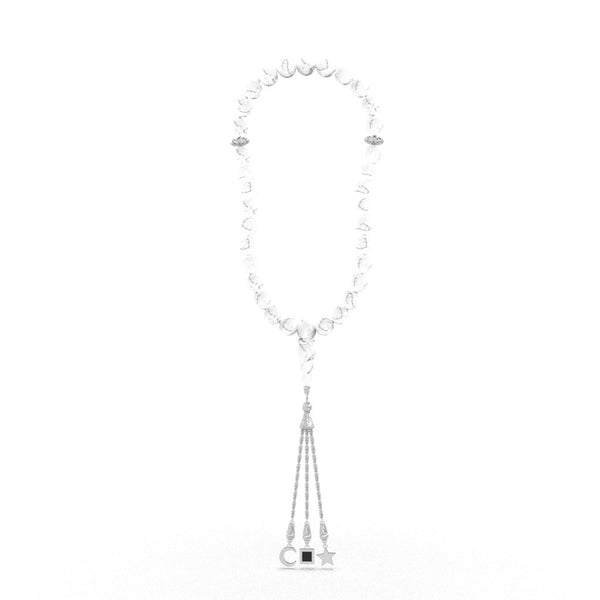 Silver tasbih with white stones and a silver pendant containing a Quran-inscribed nano chip, displayed on a white background.