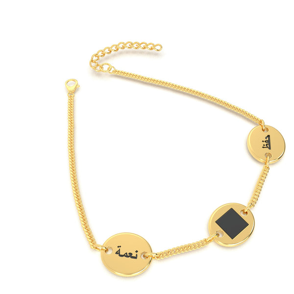 Gold bracelet with three round-and-square pendants, featuring a central square black nano chip inscribed with the entire Quran, displayed on a white background.