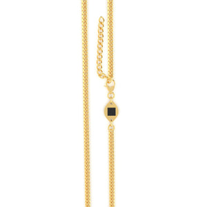 Gold Cuban chain necklace featuring a black nano chip near the clasp that contains the full Quran, displayed on a white background.