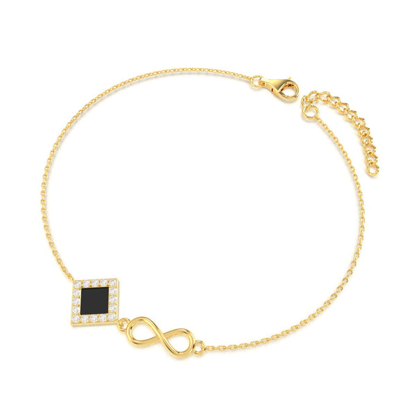 Gold bracelet with an intertwined side design and a central square pendant containing a black nano chip inscribed with the entire Quran, displayed on a white background.