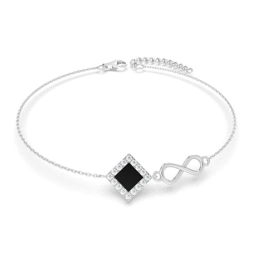 Silver bracelet with an intertwined side design and a central square pendant containing a black nano chip inscribed with the entire Quran, displayed on a white background.