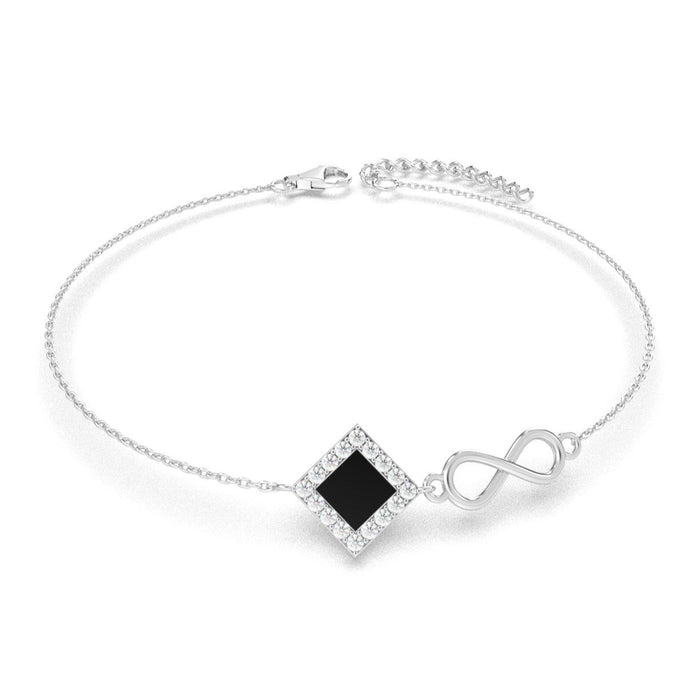 Silver bracelet with an intertwined side design and a central square pendant containing a black nano chip inscribed with the entire Quran, displayed on a white background.