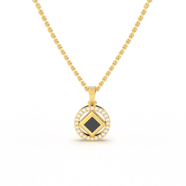 Elegant gold necklace with a round pendant featuring a black center stone and a nano chip micro-engraved with the entire Quran.