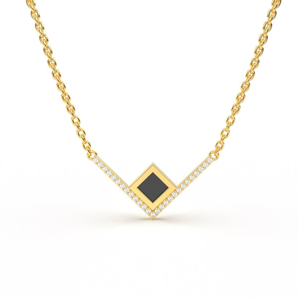 Gold necklace with an intertwined pendant featuring a square black nano chip containing the full Quran, displayed on a white background.