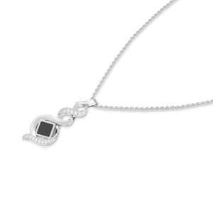 Silver necklace with an intertwined pendant featuring a square black nano chip containing the full Quran, displayed on a white background.