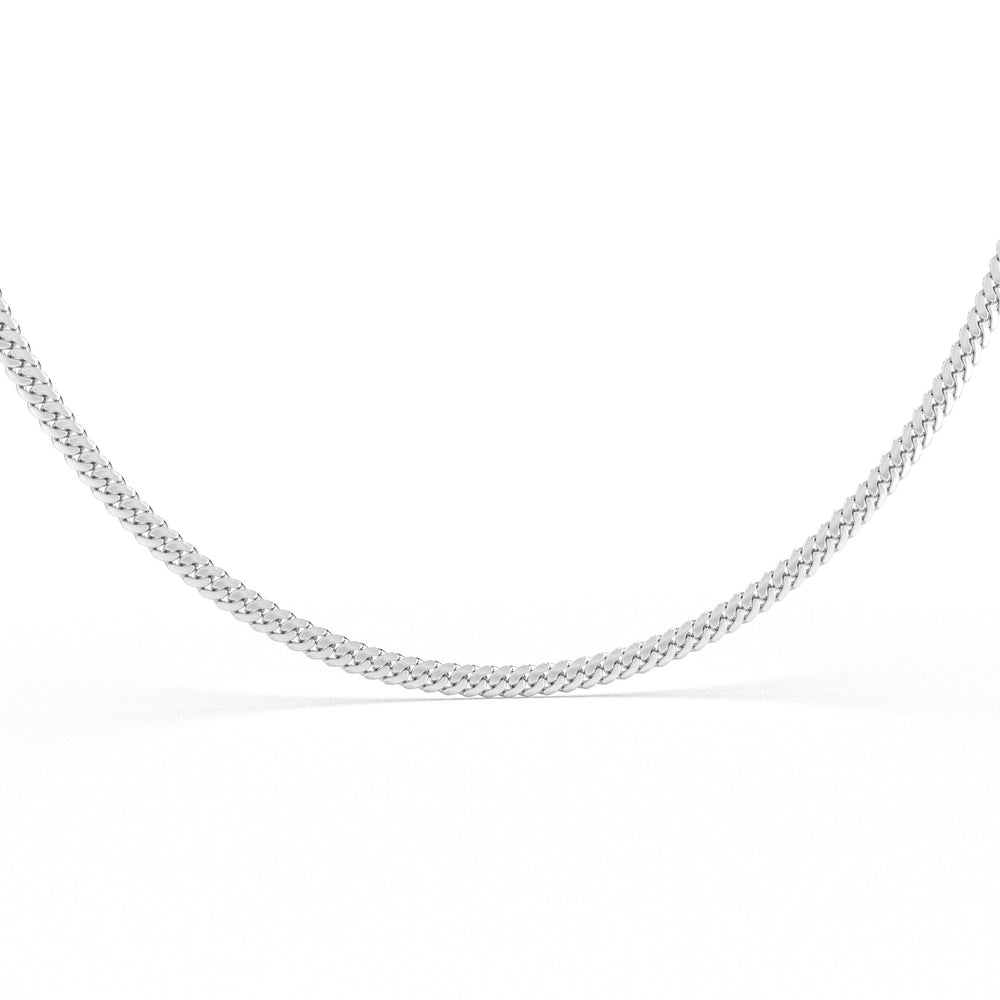 Silver Cuban chain necklace featuring a black nano chip near the clasp that contains the full Quran, displayed on a white background.