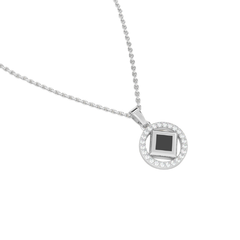 Elegant silver necklace with a round pendant featuring a black center stone and a nano chip micro-engraved with the entire Quran.