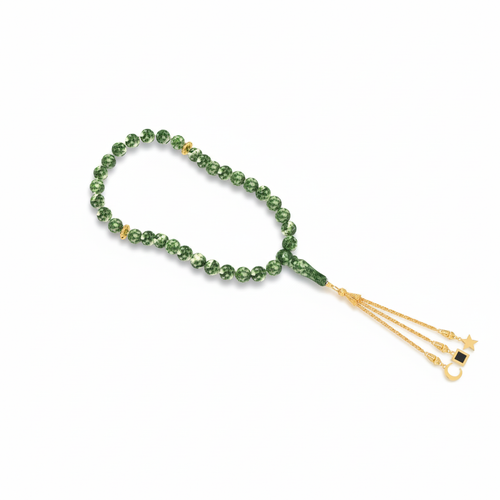 Green gemstone tasbih with a gold-plated tassel, featuring a nano chip micro-engraved with the entire Quran.