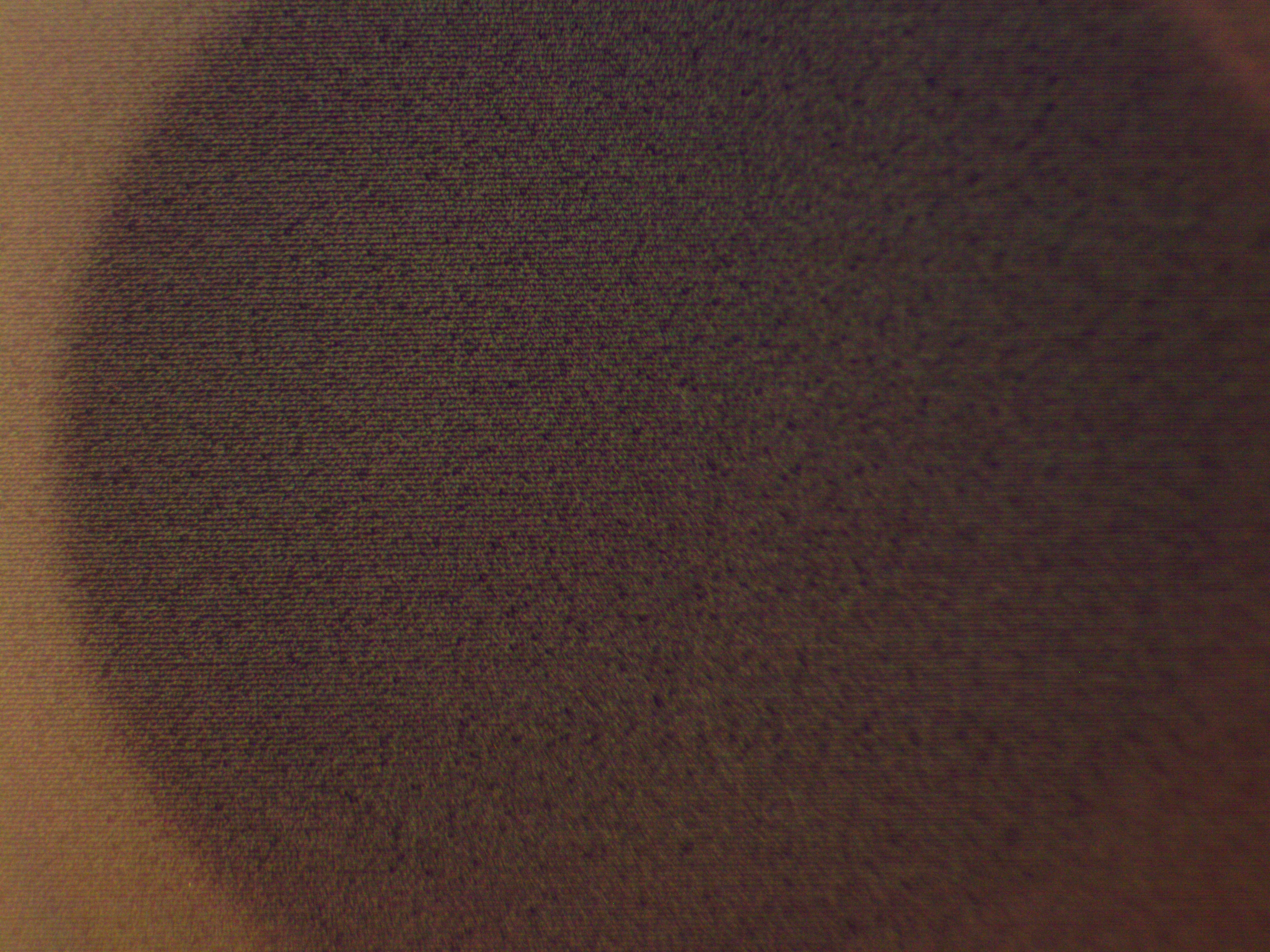 Microscopic close-up view of our black nano chip engraved with the entire Quran.