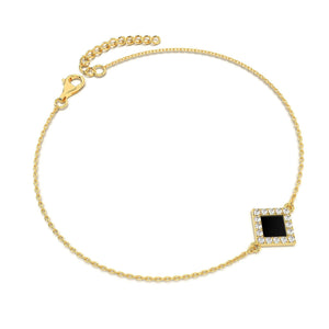 Gold bracelet with a square black nano-chip charm containing the full Quran, displayed on a white background.
