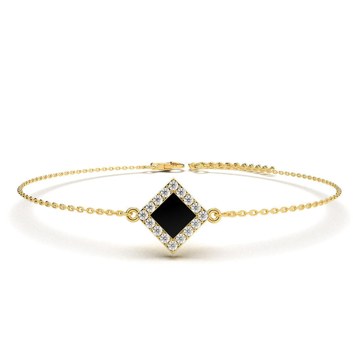 Gold bracelet with a square black nano-chip charm containing the full Quran, displayed on a white background.
